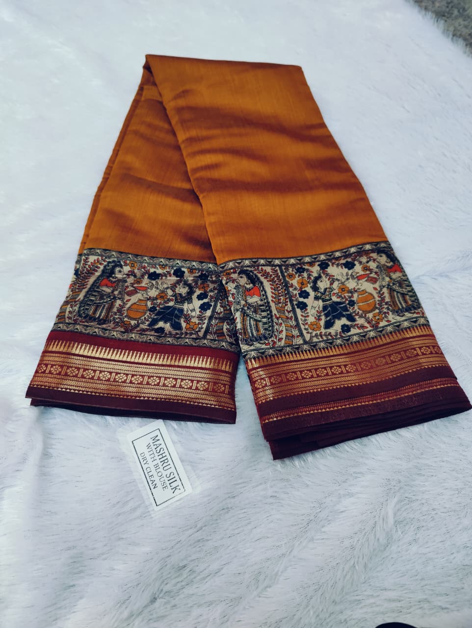 Vibrant mustard yellow Silk Saree with Embroidered Border