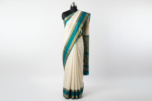 White Silk Saree with Gap Border on Mannequin